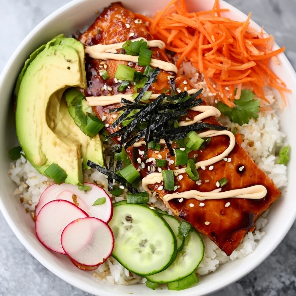 Fluffy jasmine rice topped with teriyaki salmon rice taco bowls with pickled veggies, avocado slices, and colorful garnishes.