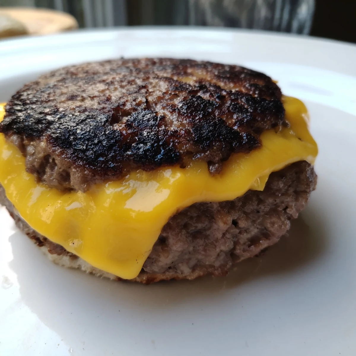 Juicy beef hamburger patties cooked perfectly in air fryer with toasted buns