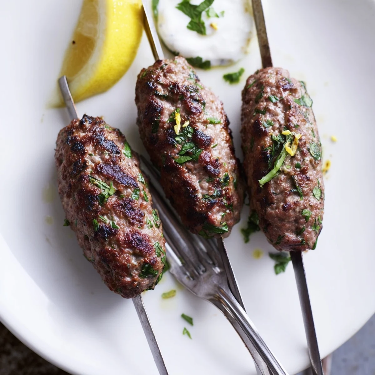 Lamb Kofta Kebabs Recipe grilled to smoky perfection, served over fluffy rice
