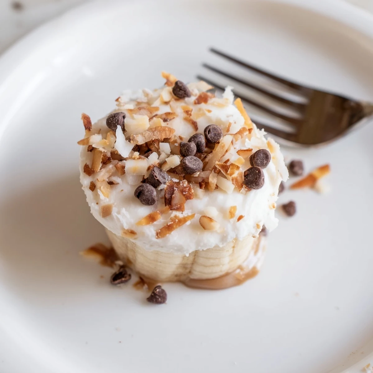 Homemade Frozen Banana Yogurt Bites with toasted coconut, chilled and bite-sized