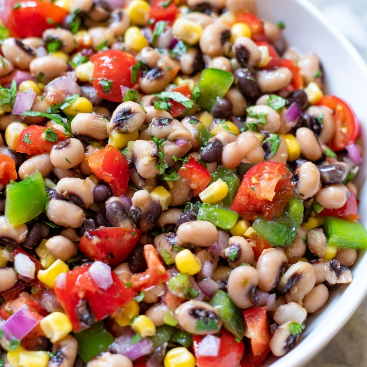 Zesty Cowboy Caviar bursting with black beans, corn, and tangy lime dressing