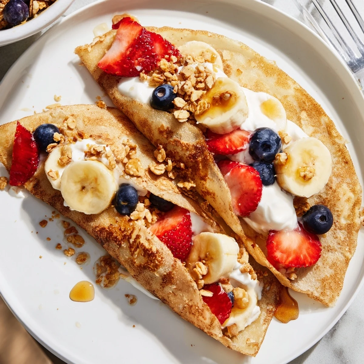Golden pancake tacos stuffed with scrambled eggs and crispy bacon for a savory breakfast twist.